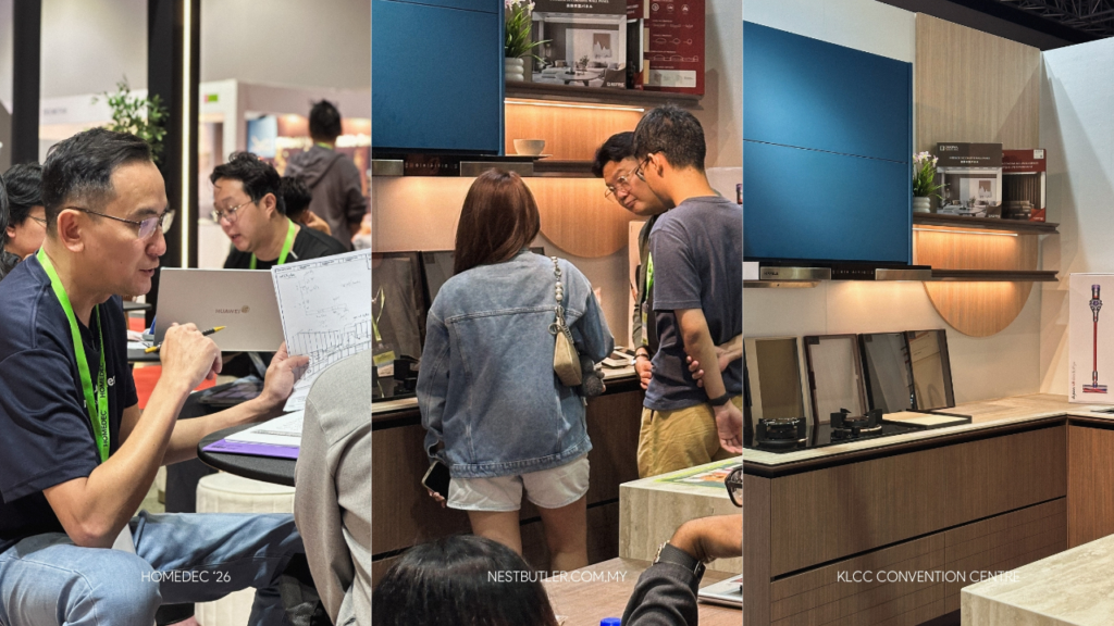 Visitors exploring a modern kitchen cabinet display and speaking with design representatives at Nest Butler HOMEDEC APR 2026
